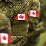 Canadian flag on the arms of the military